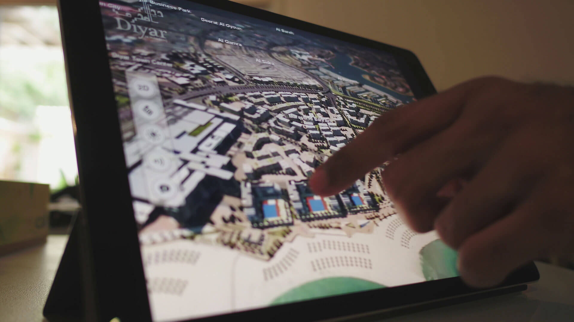 CityView Lite on a tablet held by a presenter