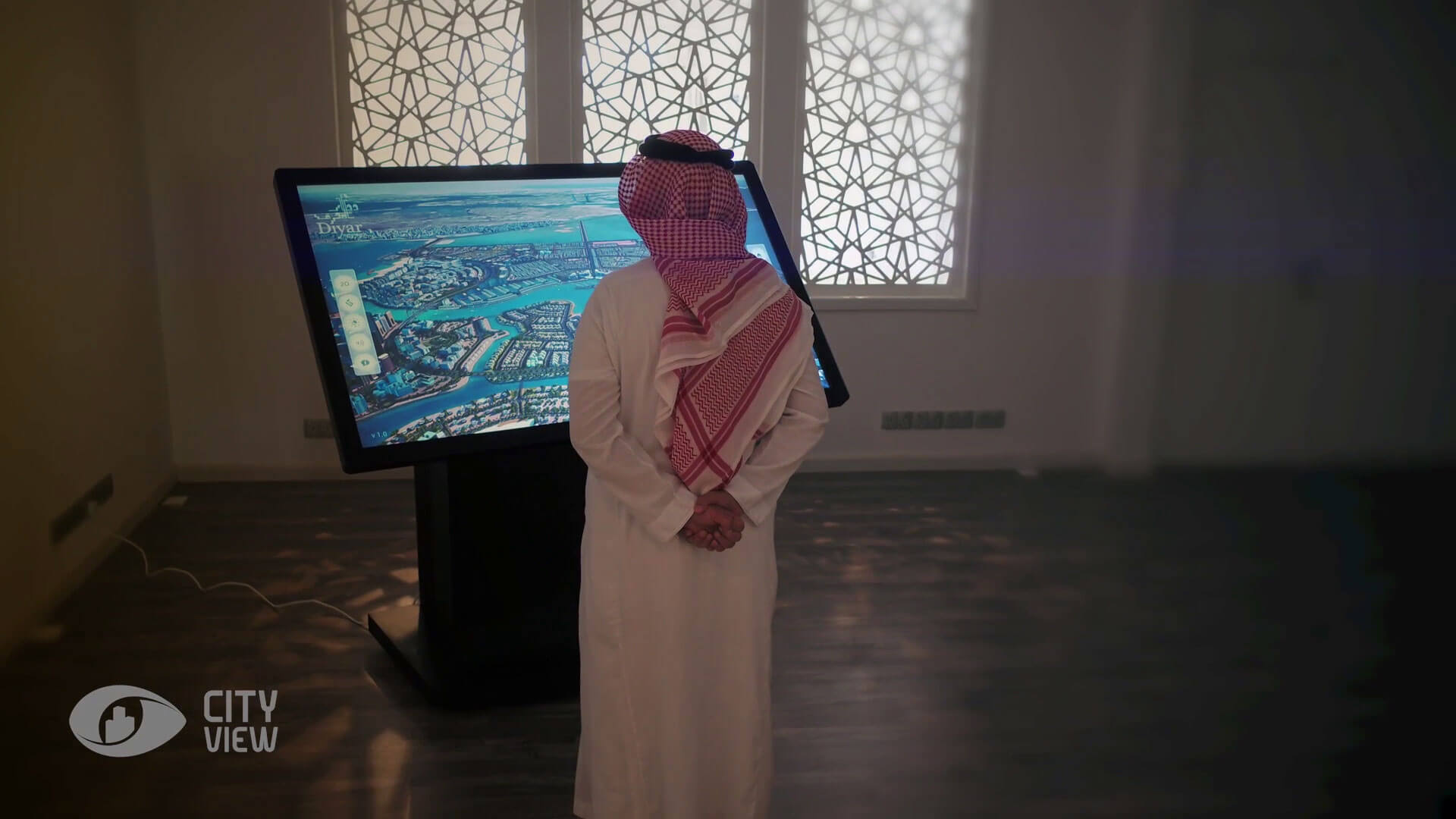 A presenter navigating a masterplan on the CityView touchscreen